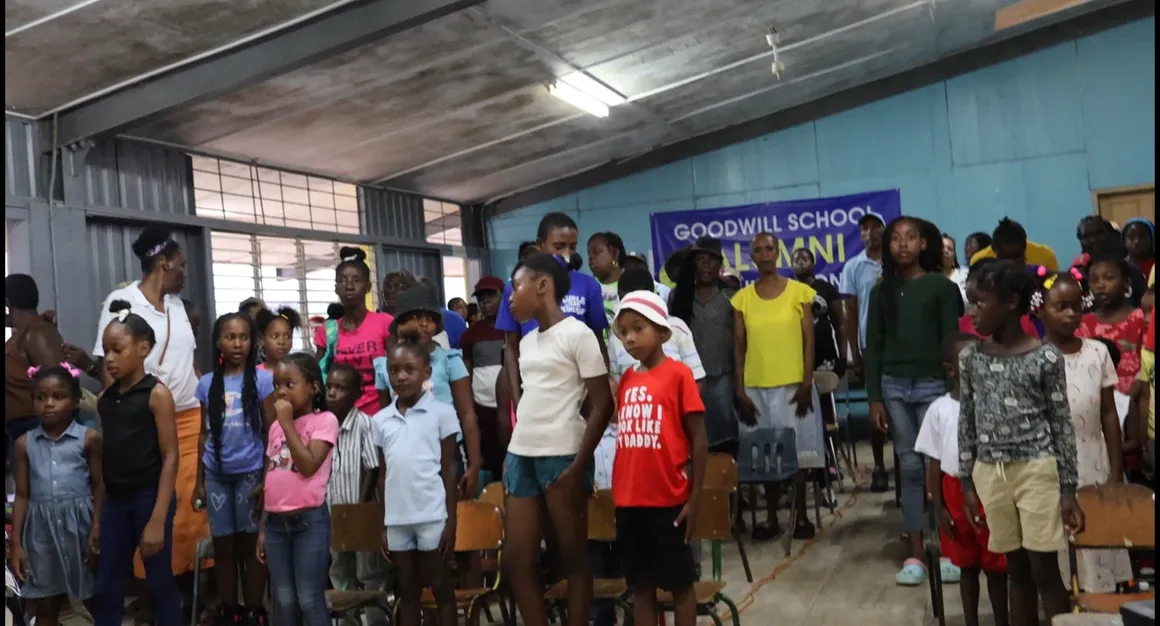 Children standing at community gathering