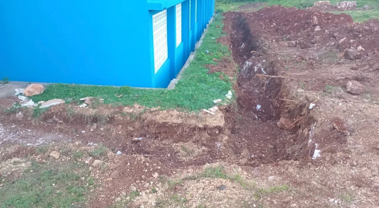 Foundation trench dug alongside the school building